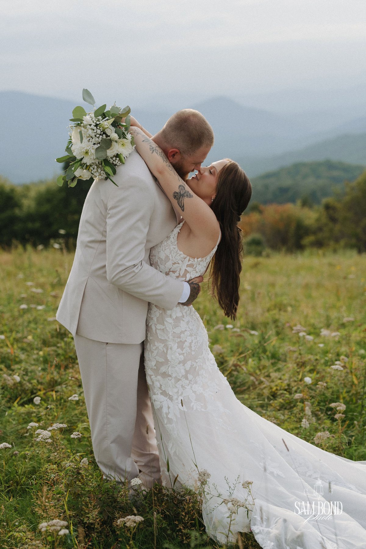 Kenneth dipping Ashley for a kiss in the Max Patch meadow