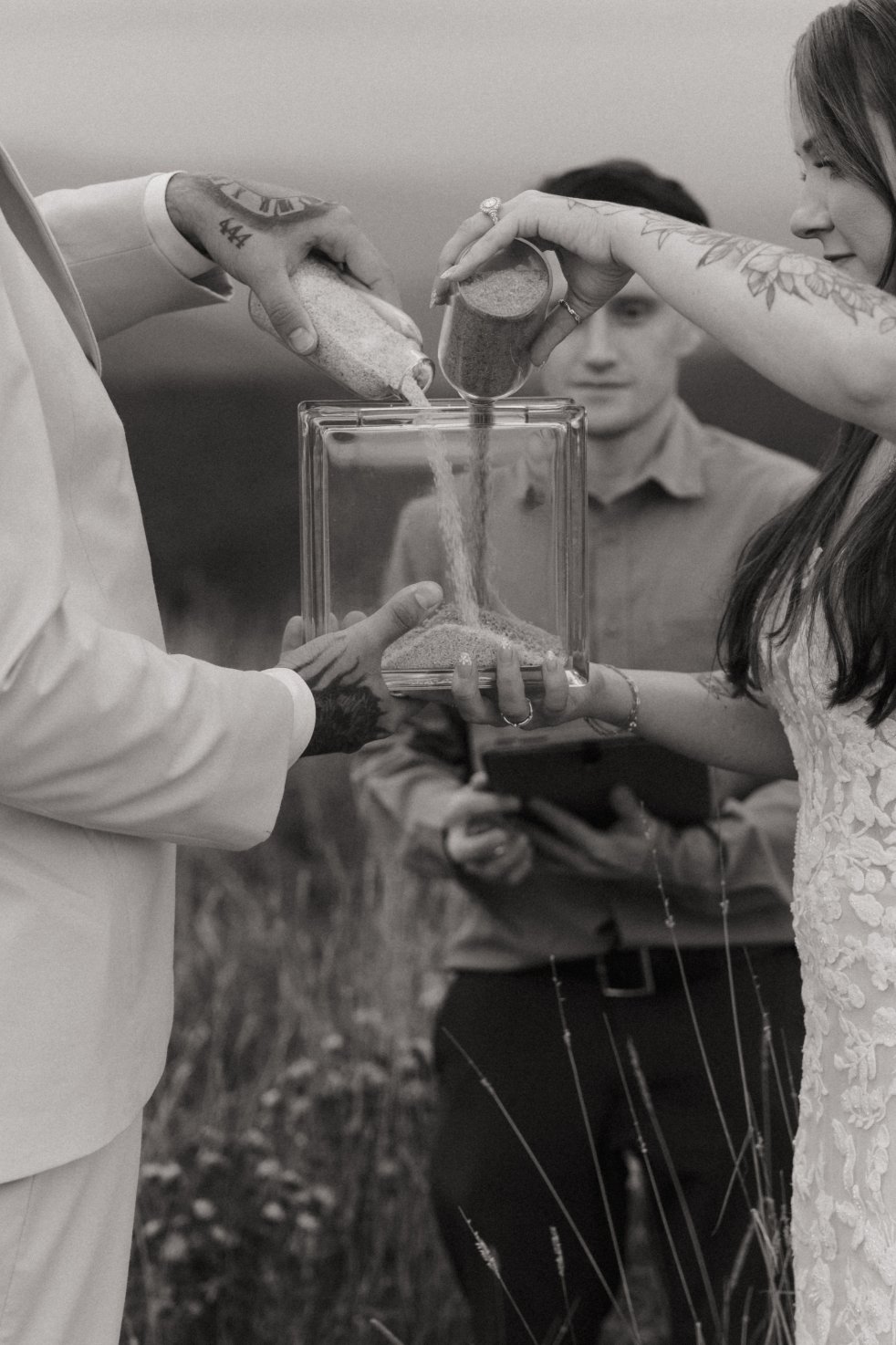 Ashley and Kenneth's unity sand ceremony in black and white