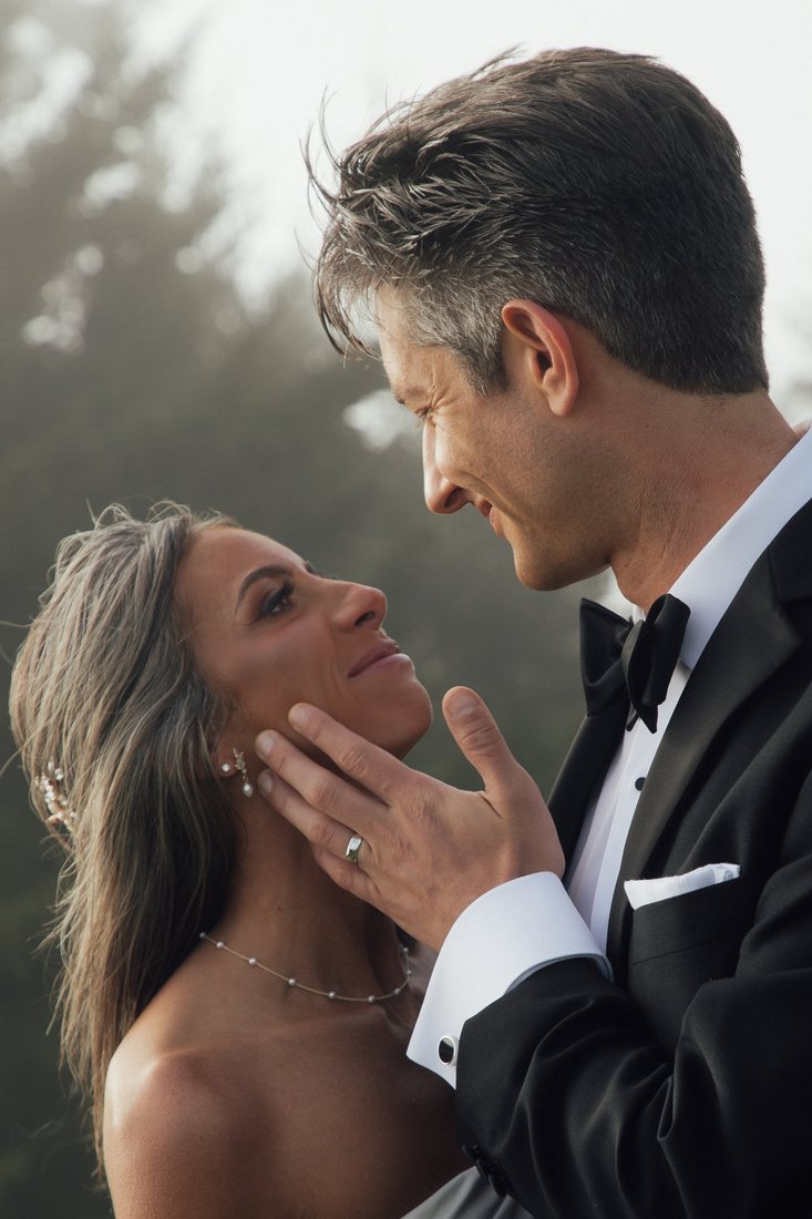Close portrait of Taylor and Austin in their wedding clothes